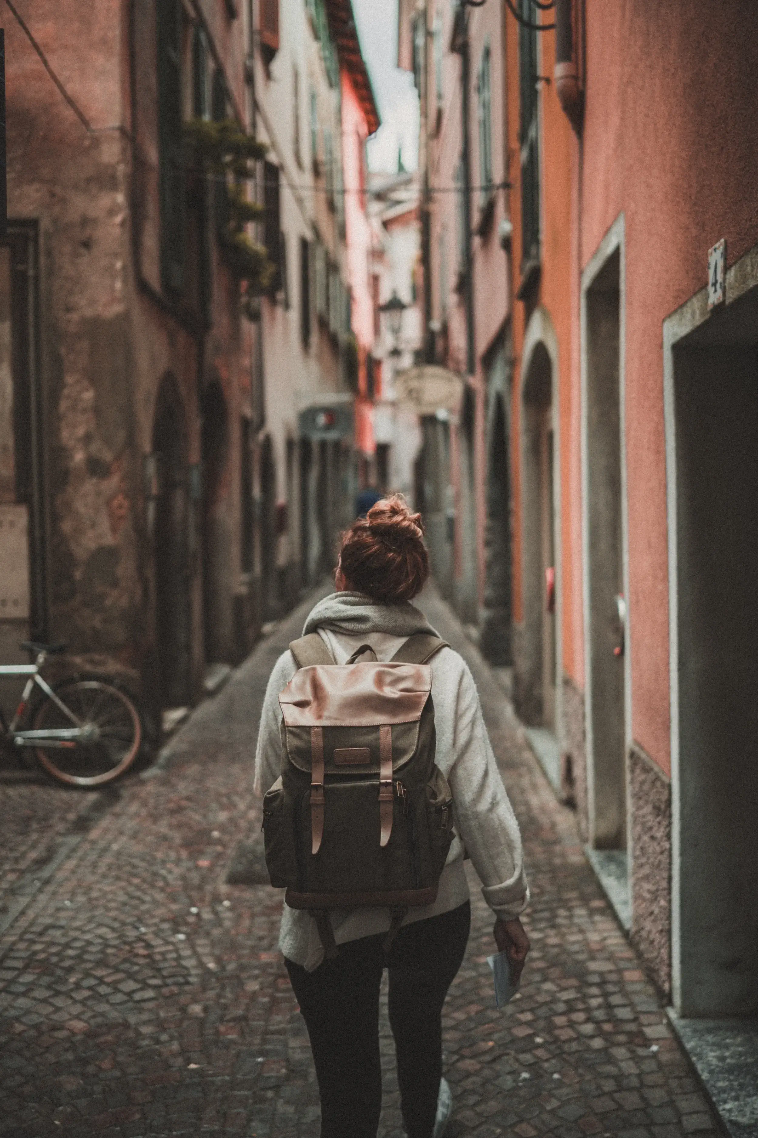 backpacker walking through city streets